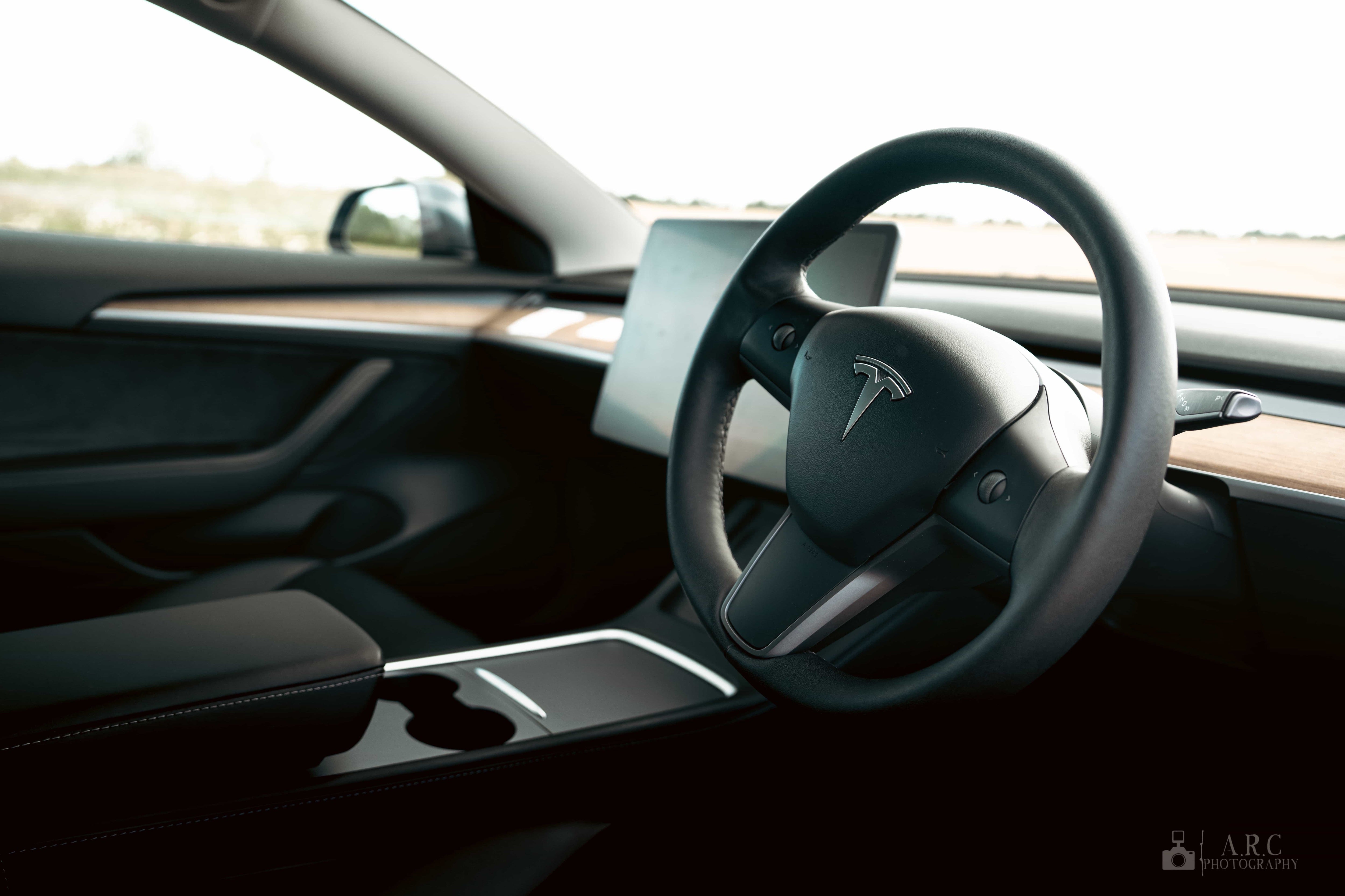 Steering wheel of a Tesla car interior